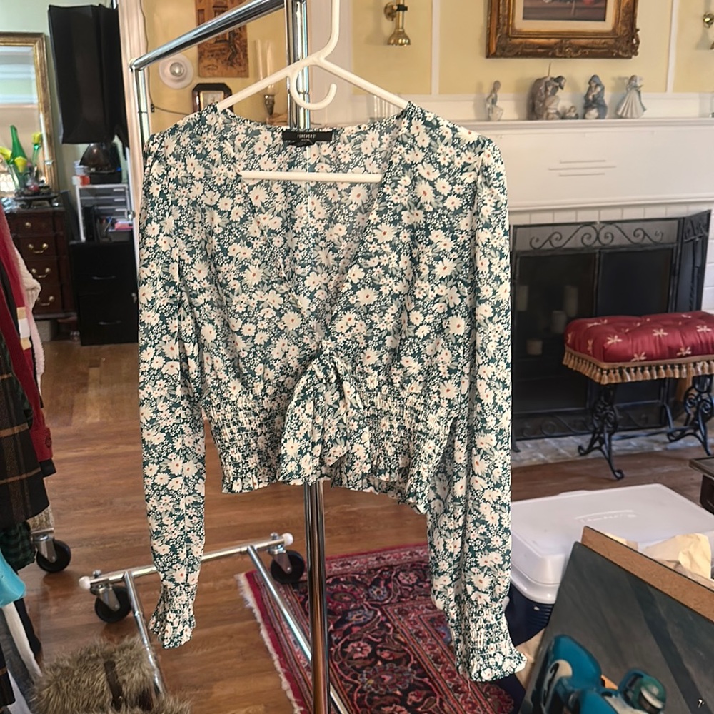 Forever 21 top with a green, blue, and white flower pattern in good condition